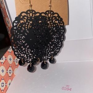 Black filigree earrings with bead accent